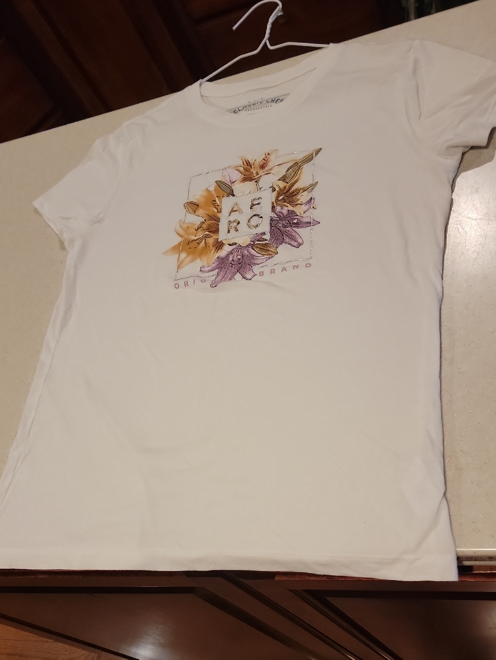 Aeropostale White Tee with Yellow & Purple Floral Logo
